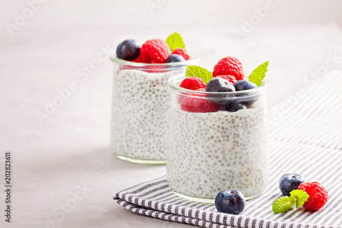 Chia pudding with fresh berries and almond milk. Superfood concept. Vegan, vegetarian and healthy eating diet with organic products