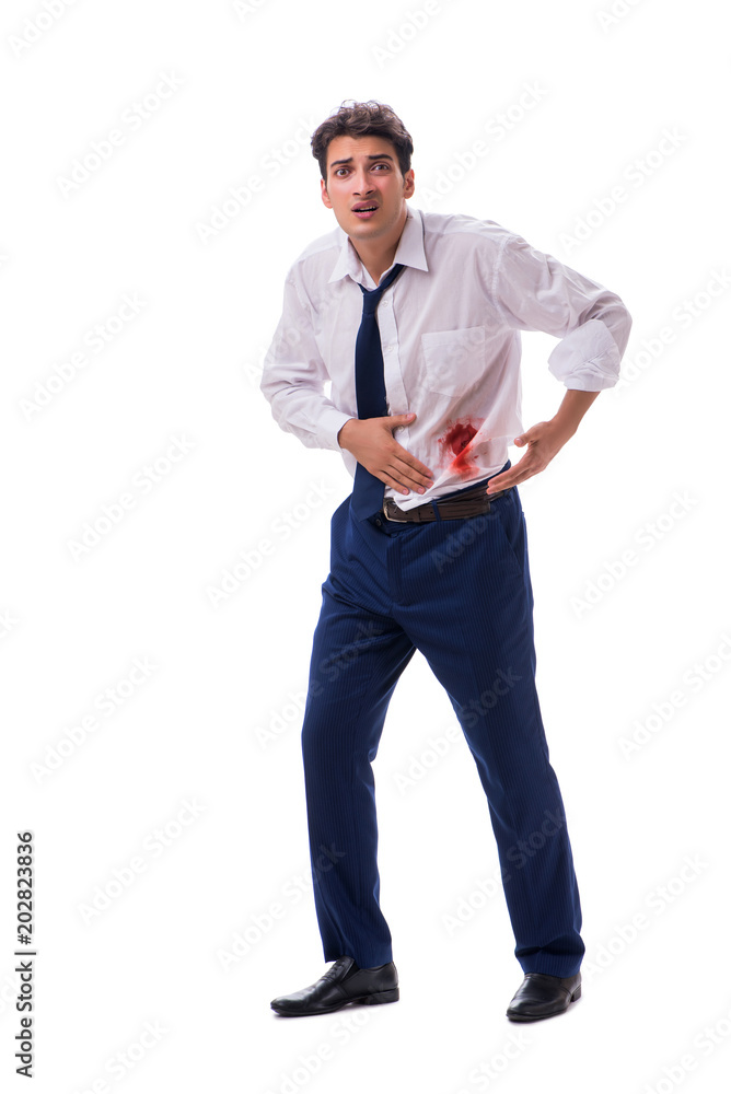 Wounded businessman with blood stains isolated on white backgrou Wounded businessman with blood stains isolated on white backgrou