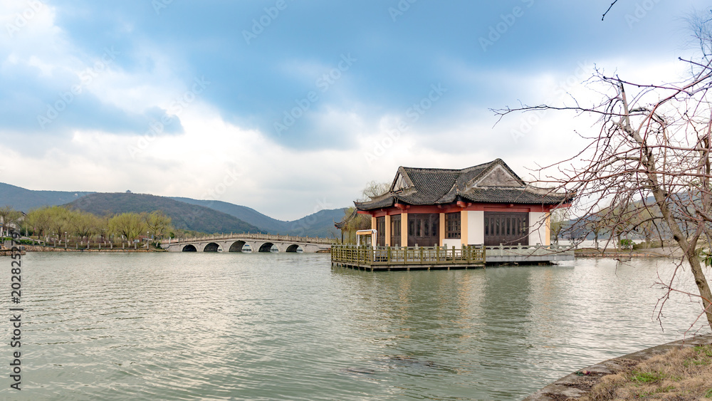 bridge and pagoda at beihu lake, china