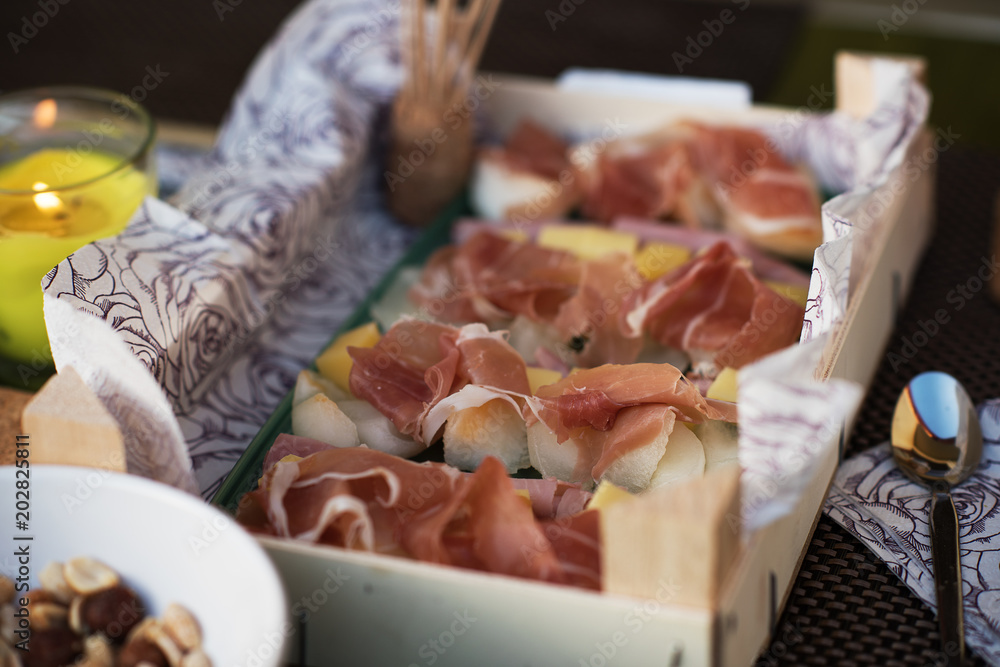 dry cured ham with melon and cheese platter 