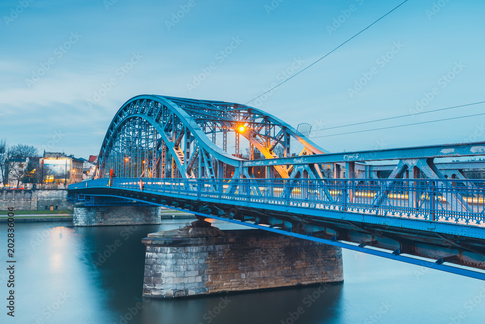 Obraz premium View of Pilsudzki bridge in Krakow at twilight, Poland
