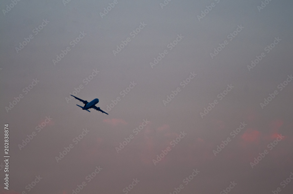 Airplane at sunset Airplane at sunset
