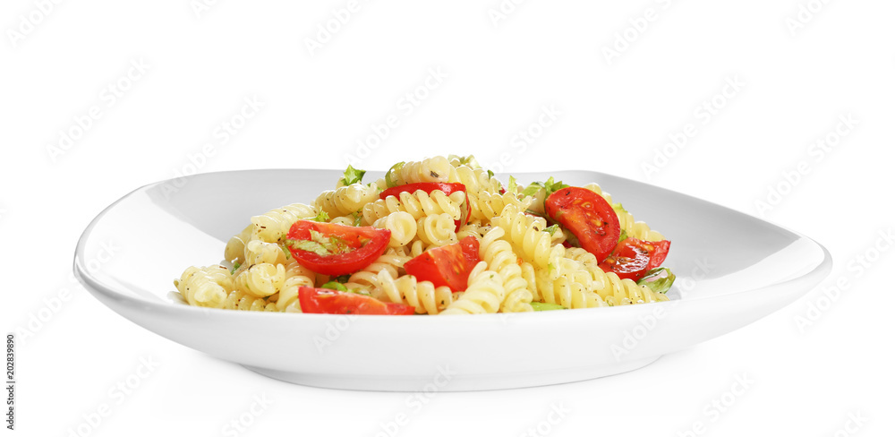 Tasty pasta salad with basil and fresh tomatoes on white background Tasty pasta salad with basil and fresh tomatoes on white background