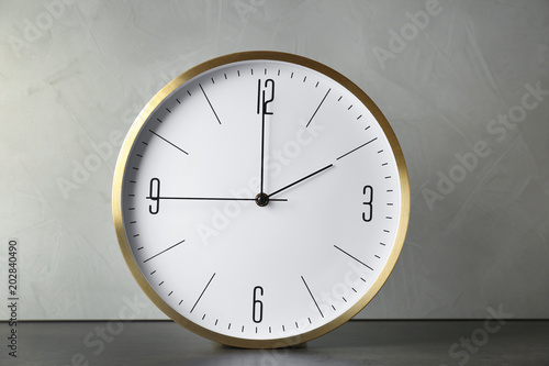 Big clock on table. Time change concept