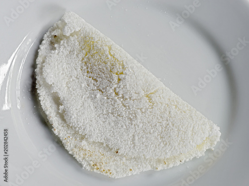 Beiju of tapioca on white plate