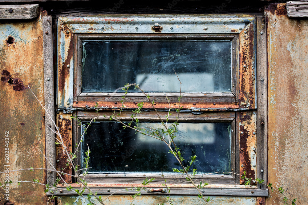 old rusty window. old wooden window with traces of rust old rusty window. old wooden window with traces of rust