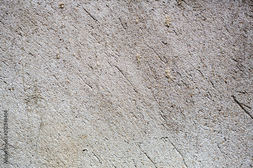 plastered wall close-up. texture of plaster with cracks.