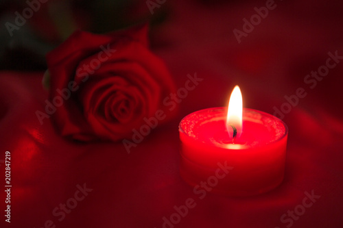 Candle with red rose