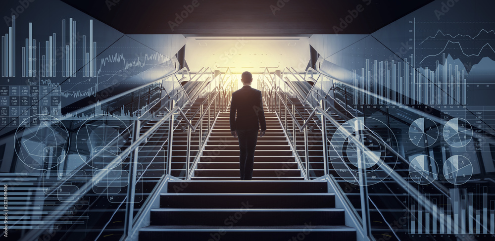 Fotografia Businessman on staircase low angle view.