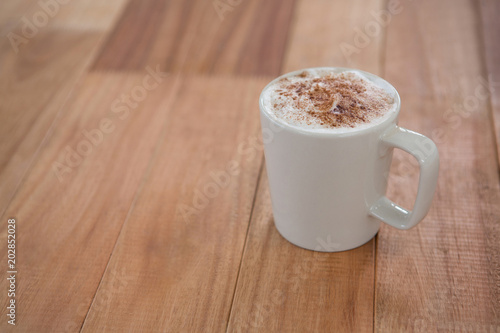 Fototapeta Naklejka Na Ścianę i Meble -  Coffee served in white mug