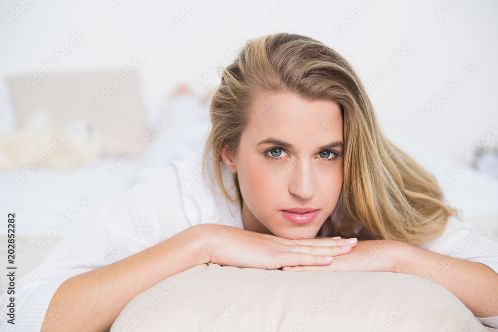 Relaxed gorgeous model lying on her bed Relaxed gorgeous model lying on her bed