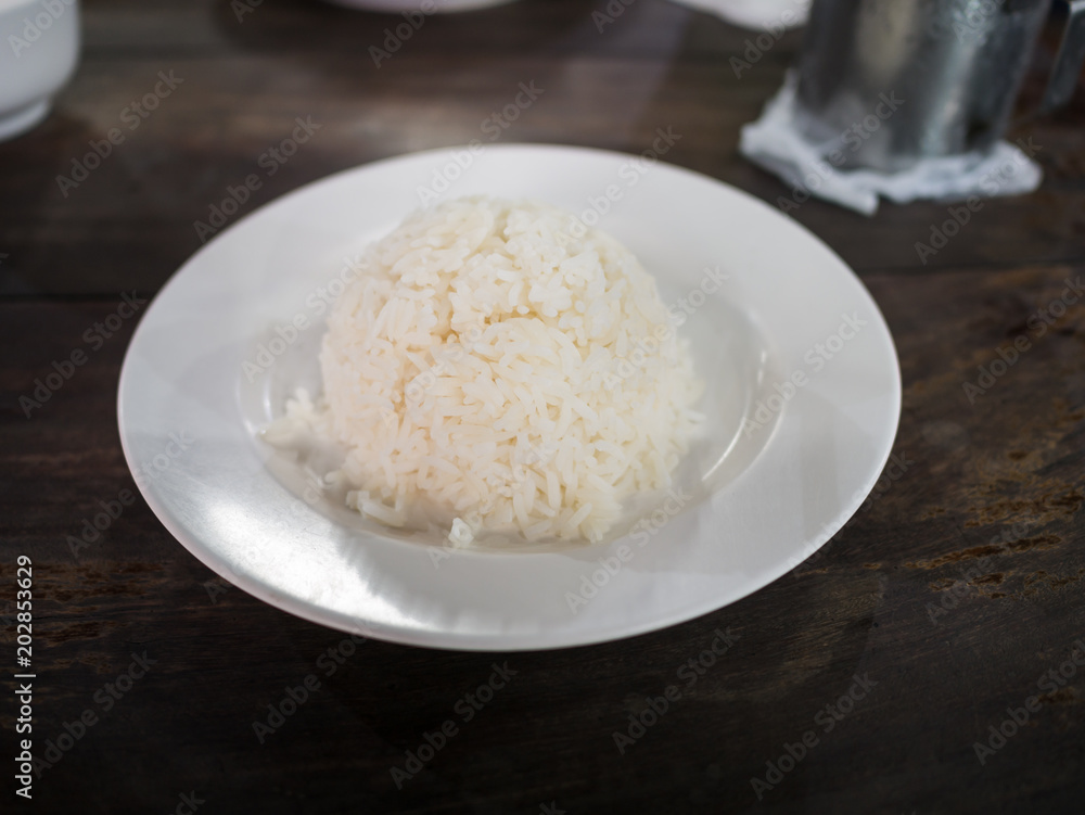 Steamed rice in the dish placed on the table Steamed rice in the dish placed on the table