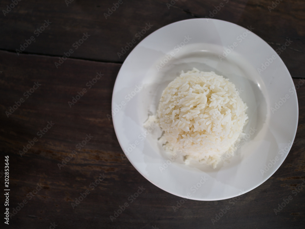 Steamed rice in the dish placed on the table Steamed rice in the dish placed on the table