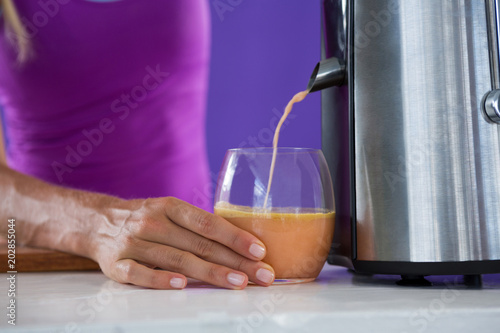 Woman preparing smoothie