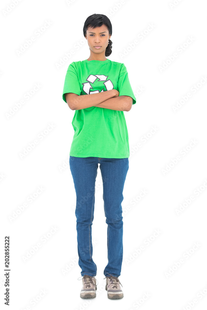 Fototapeta premium Frowning black haired ecologist posing with crossed arms
