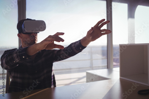 Entrepreneur testing virtual reality technology
