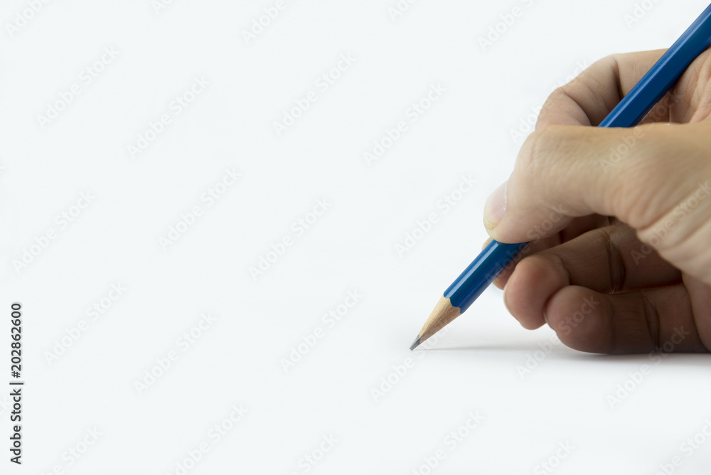 Free space while background with people habd is writing by pencil. Free space while background with people habd is writing by pencil.