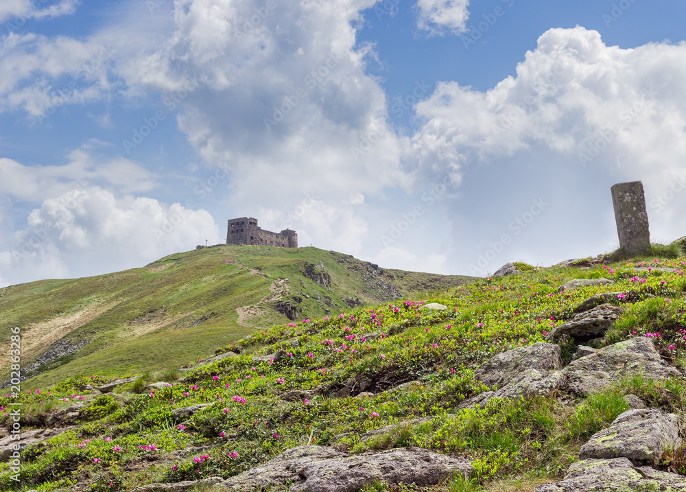 Ruins of old observatory on the mountain peak in Carpathians