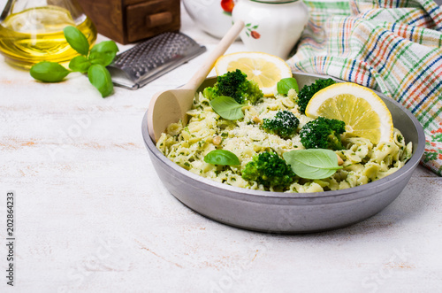 Traditional pasta tripoline with pesto photo