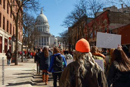 Teens marching to the capitol in protest of gun violence photo