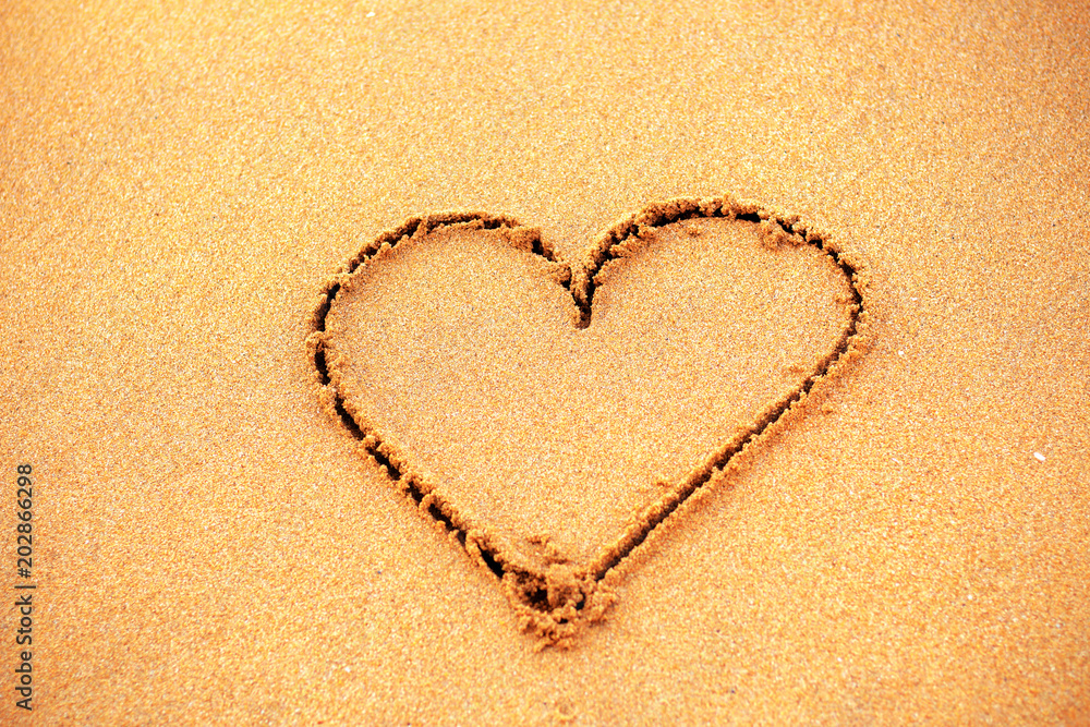 Heart on sand beach. Heart on sand beach.