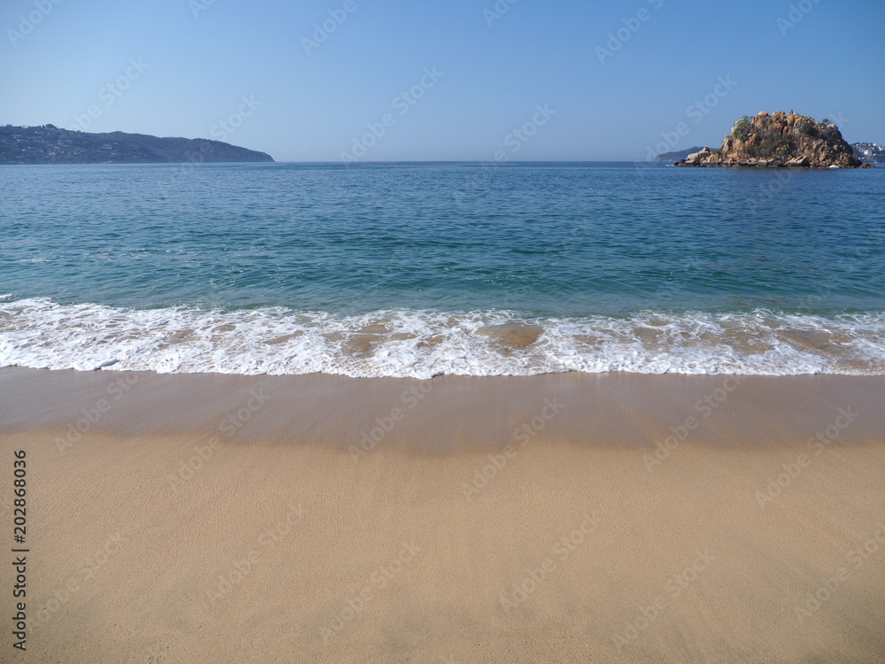 Panoramic view of picturesque rocks at bay of ACAPULCO city in Mexico Pacific Ocean waves on sandy beach landscape