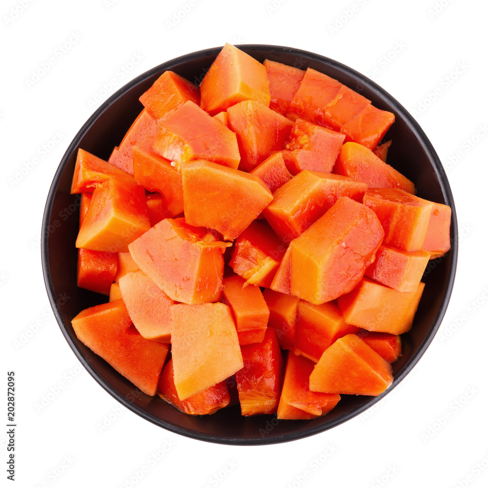 Cut into pieces of ripe papaya fruit isolated on white background Cut into pieces of ripe papaya fruit isolated on white background