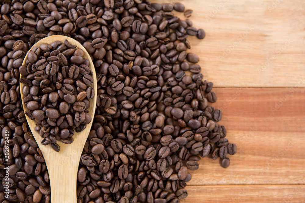 Fototapeta premium Roasted coffee beans with spoon