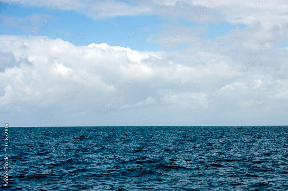 Sky and water of indian ocean