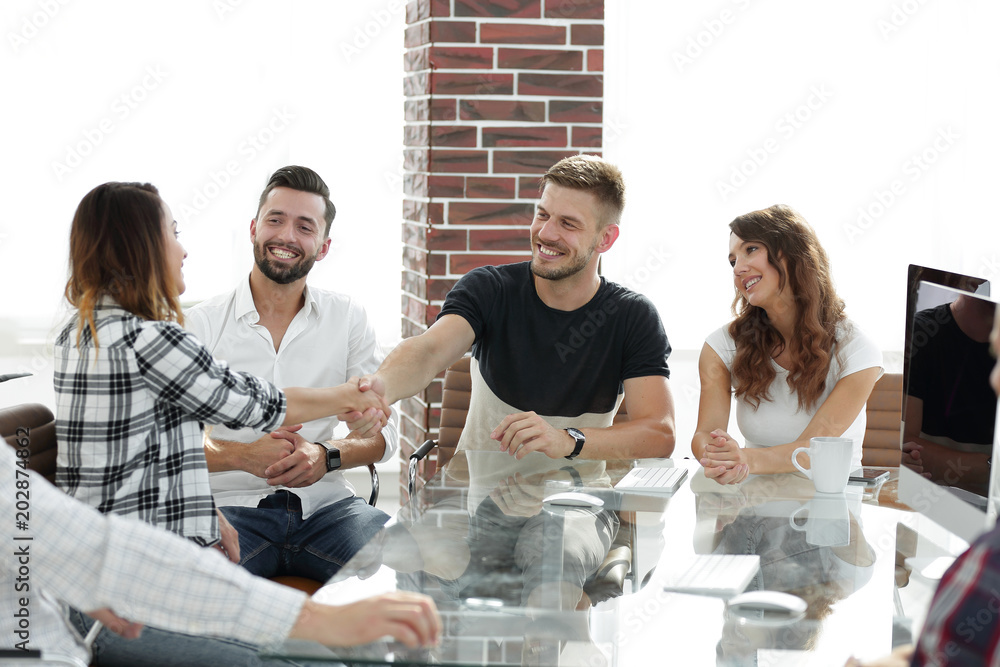 Fototapeta premium handshake of young employees