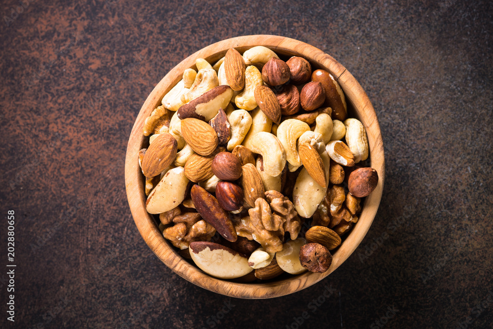 Nuts assortment in a bowl top view. Nuts assortment in a bowl top view.