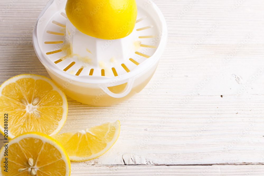 Lemon and juice on a white background Lemon and juice on a white background