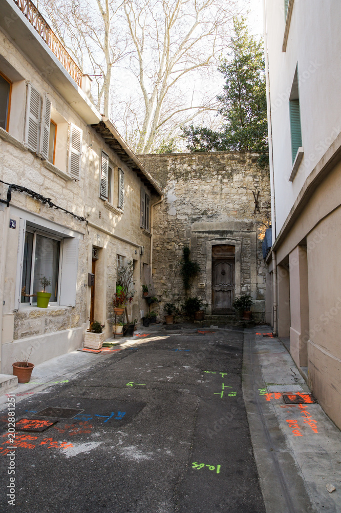 Colored inscriptions on the old asphalt.