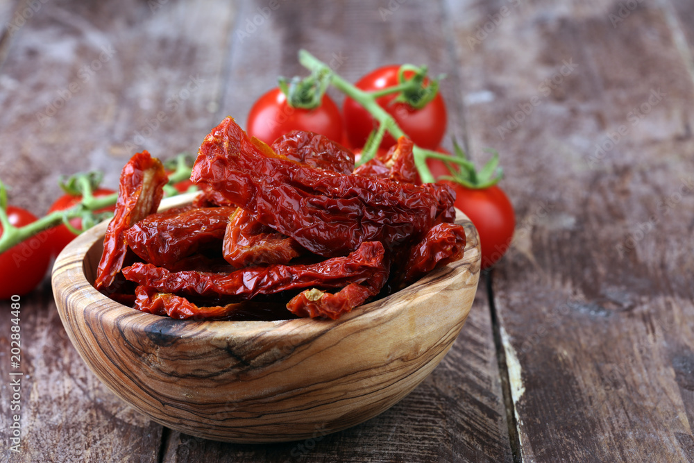 Sun dried tomatoes. tomato halves sun-dried. Sun dried tomatoes. tomato halves sun-dried.
