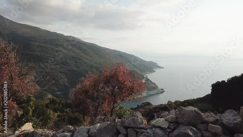 Drone footage in Corsica - 4k - Fly Above the sea - Mountain - Boat - Blue Water