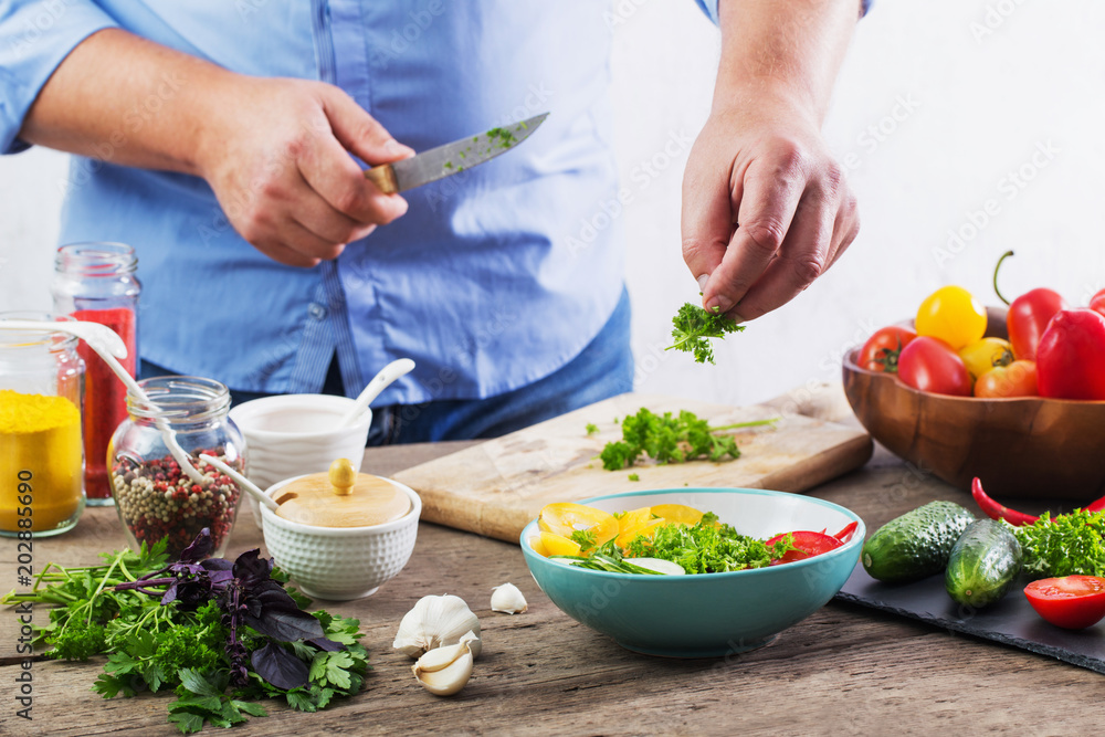 man cooking a vegetarian salad man cooking a vegetarian salad
