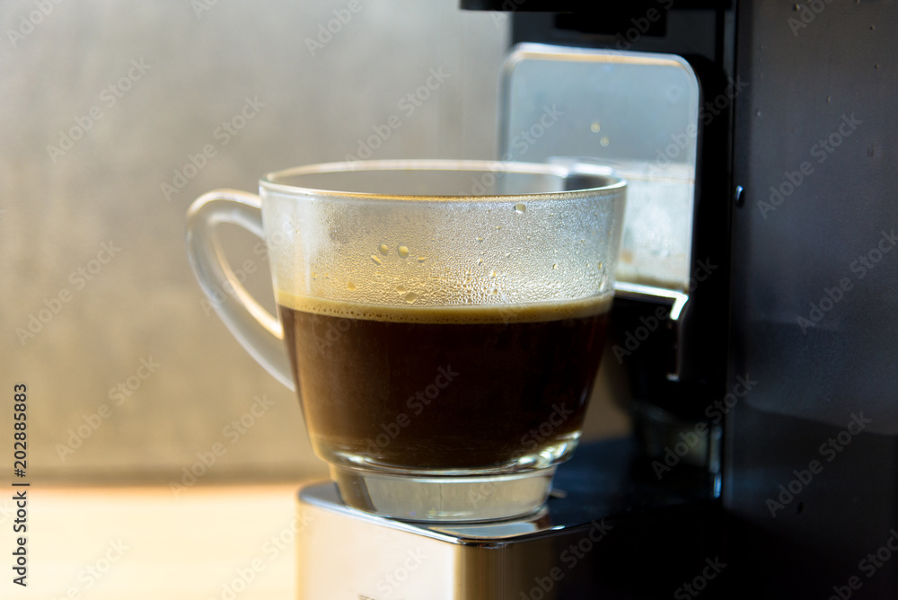 espresso machine making fresh coffee drop to coffee glass for refreshment espresso machine making fresh coffee drop to coffee glass for refreshment