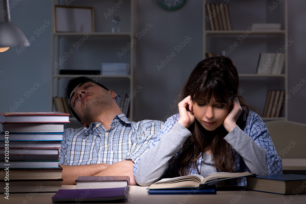 Two students studying late at night Two students studying late at night