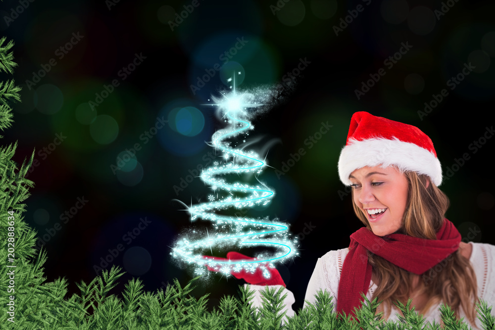 Festive blonde presenting with hand against colourful glowing dots on black
