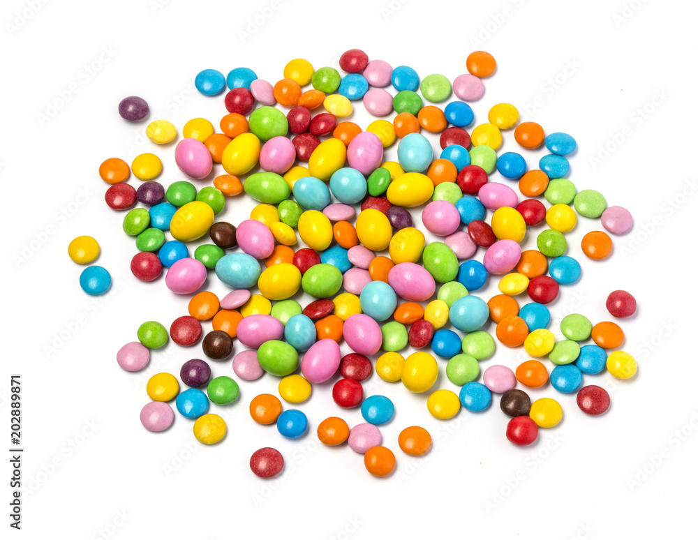 Obraz premium Colorful chocolate candy pills isolated