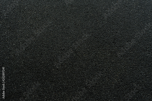 Smooth asphalt road. The texture of the tarmac,.