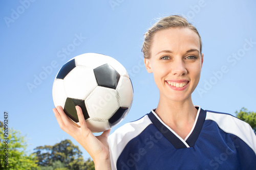 Pretty football player smiling at camera © WavebreakmediaMicro