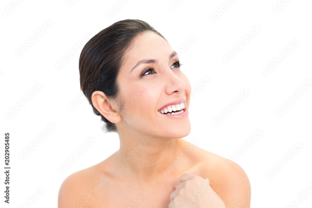 Smiling brunette looking up Smiling brunette looking up