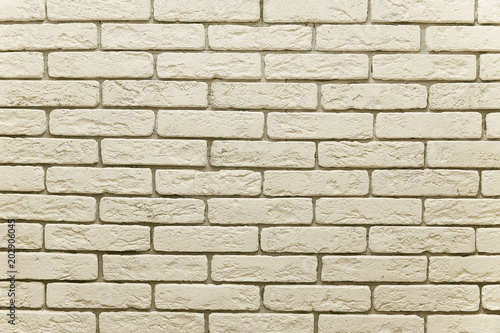 Beige brick wall background texture