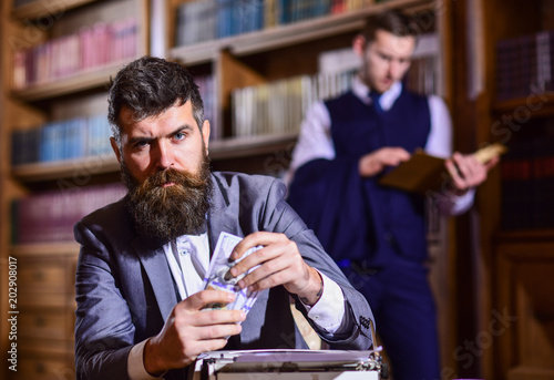 Fényképezés Man in oldfashioned suit holds money. Journalist got reward