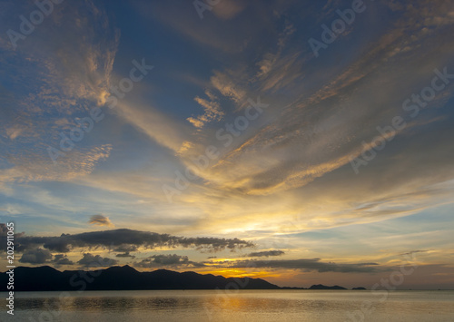 A dramatic sunset falls over the ocean near Koh Chang island  Thailand