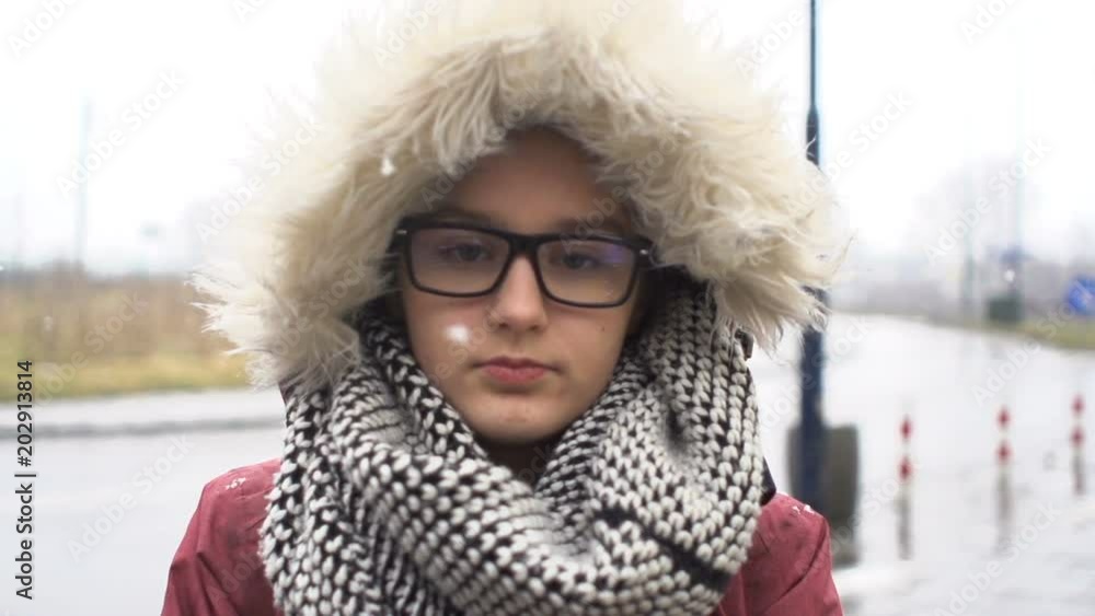 Sad, pensive young teenager girl walking in the city, slow motion
Sad, pensive young teenager girl walking in the city, slow motion