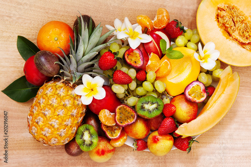 Fototapeta Naklejka Na Ścianę i Meble -  Fresh fruits. Assorted exotic fruit colorful background overhead