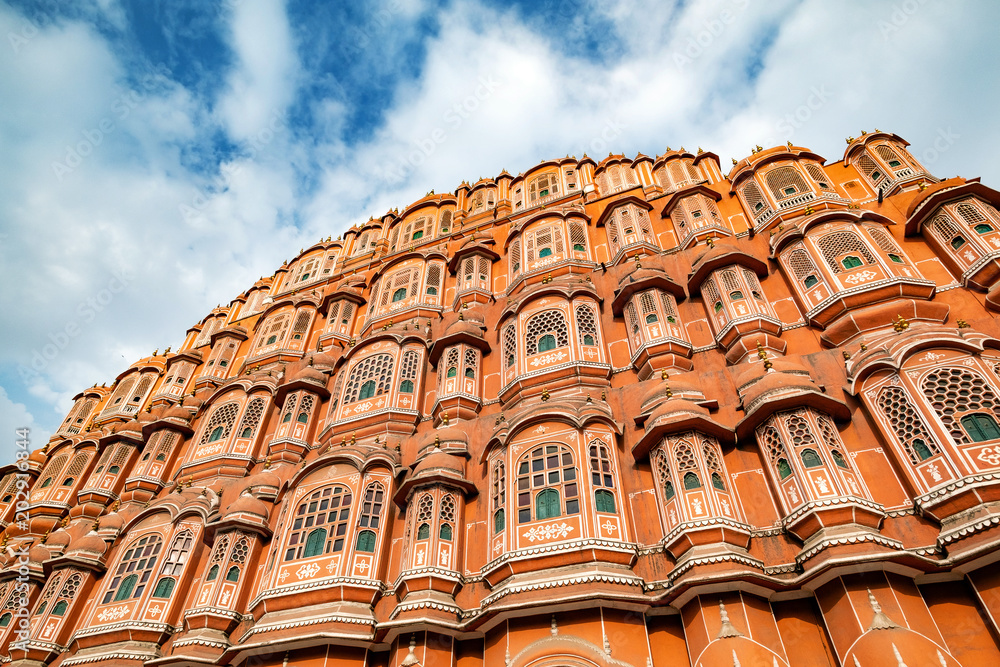 Hawa Mahal on a sunny day, Jaipur, Rajasthan, India. An UNESCO World heritage. Beautiful window architectural element.