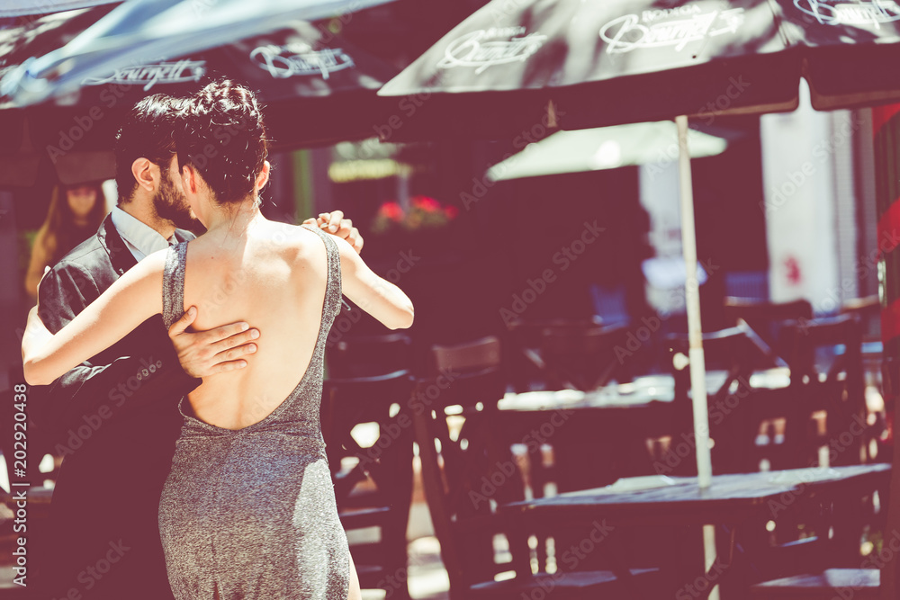 Εκτύπωση καμβά Unidentified couple dancing tango in the street in Buenos Aires, Argentina